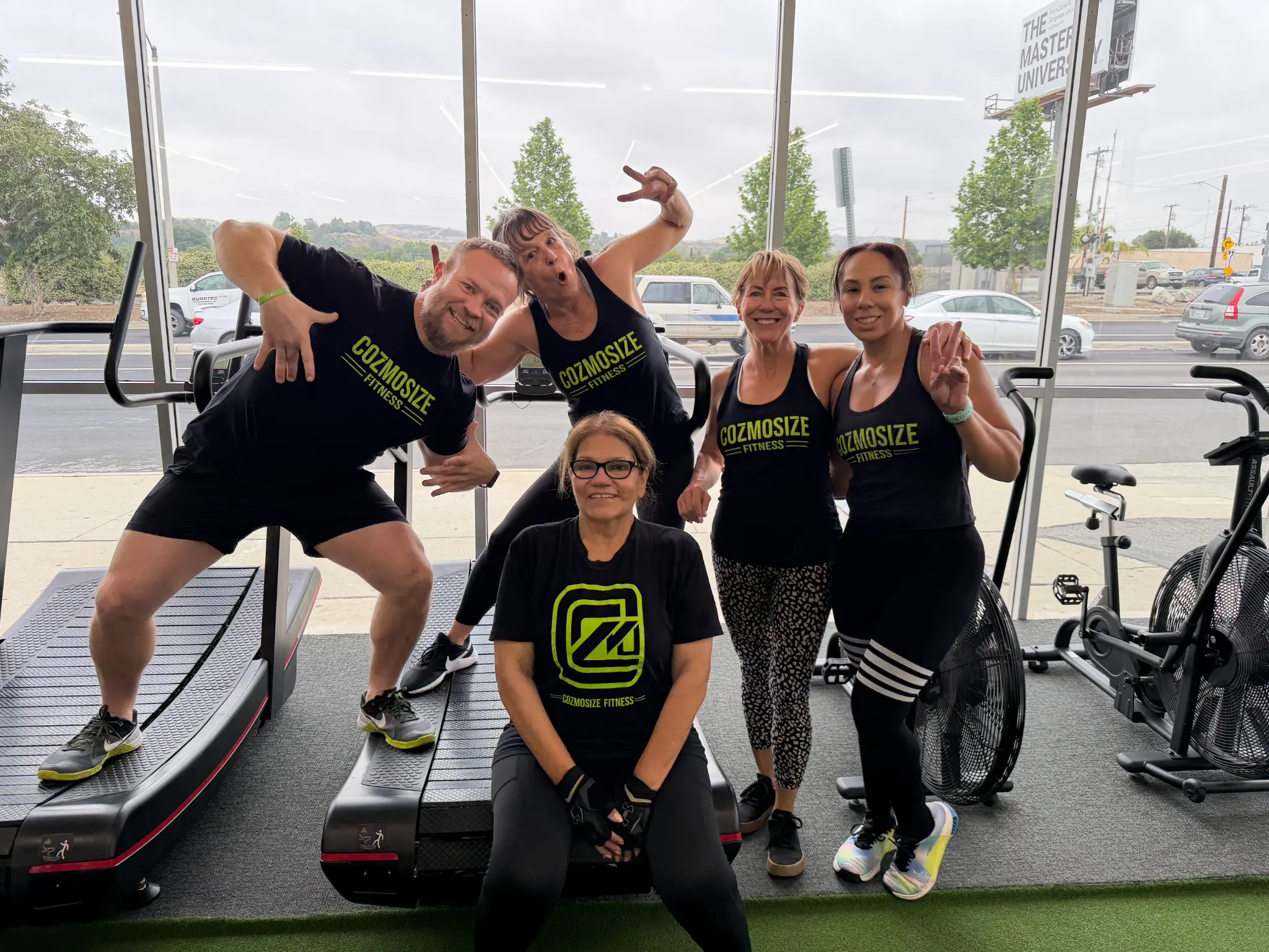 CozmoSize Fitness members together in the training space